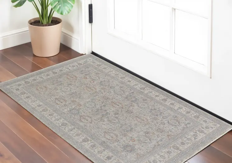 2' X 3' Silver Taupe and Blue Oriental Power Loom Worn Faded Area Rug With Fringe