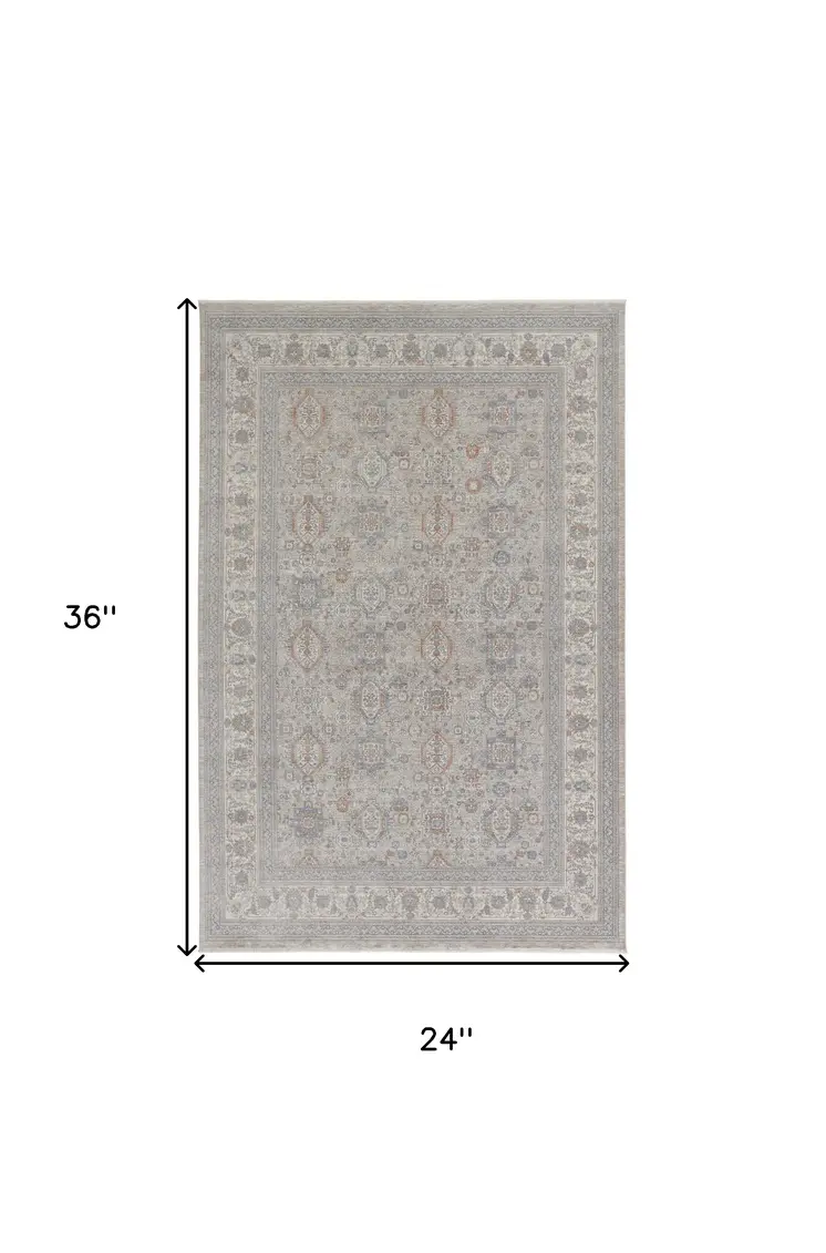 2' X 3' Silver Taupe and Blue Oriental Power Loom Worn Faded Area Rug With Fringe