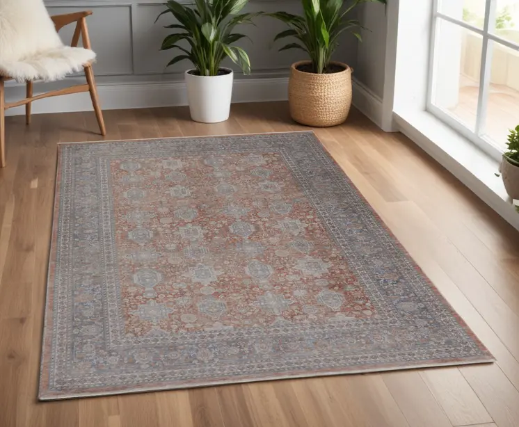 5' X 7' Blue and Red Oriental Power Loom Worn Faded Area Rug With Fringe