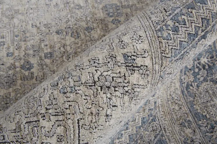 2' X 3' Gray Blue and Taupe Oriental Power Loom Worn Faded Area Rug With Fringe