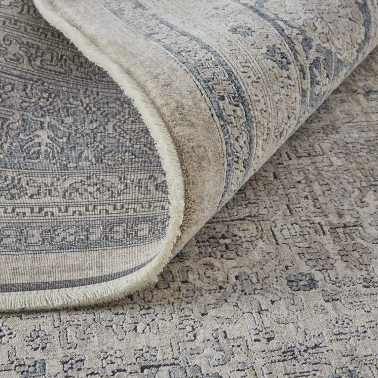 2' X 3' Gray Blue and Taupe Oriental Power Loom Worn Faded Area Rug With Fringe