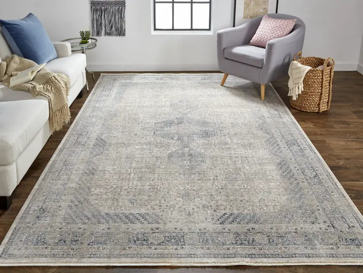 2' X 3' Gray Blue and Taupe Oriental Power Loom Worn Faded Area Rug With Fringe