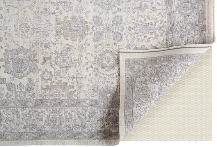 7' X 10' Gray and Ivory Oriental Power Loom Worn Faded Area Rug With Fringe