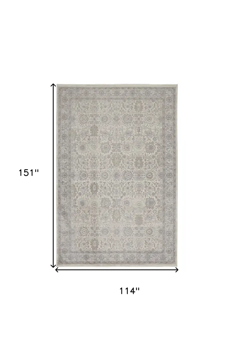 9' X 13' Gray and Ivory Oriental Power Loom Worn Faded Area Rug With Fringe