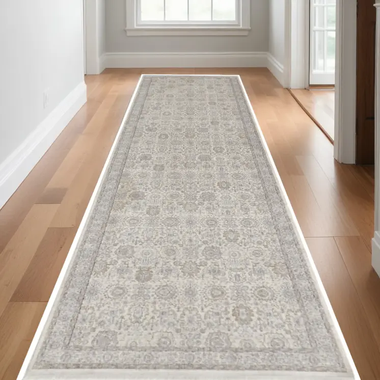 10' Gray and Ivory Oriental Power Loom Runner Rug With Fringe