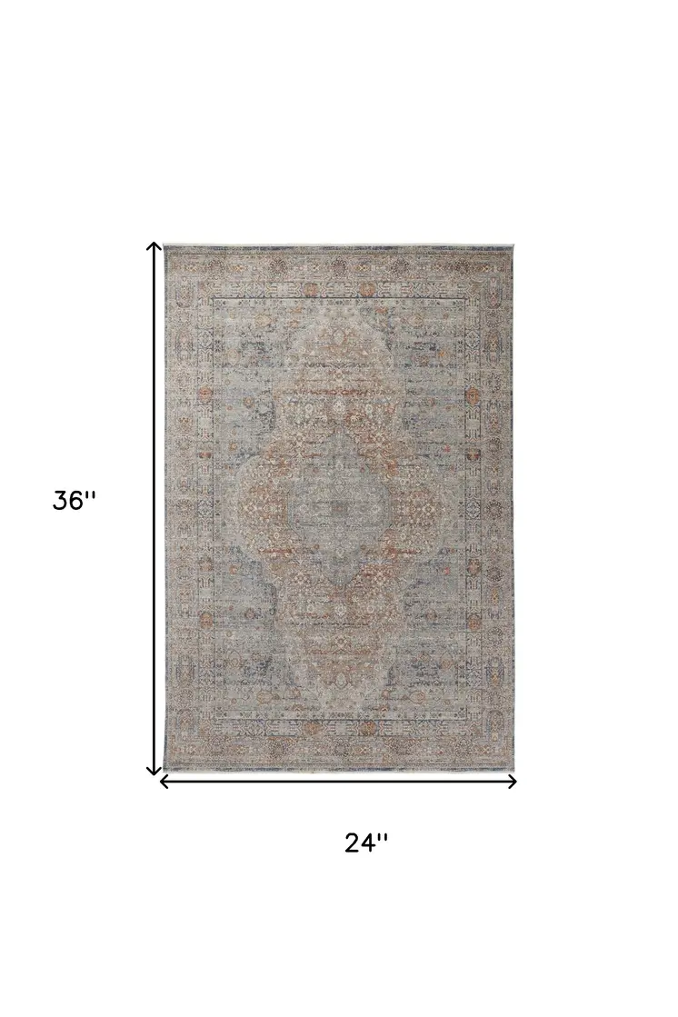 2' X 3' Gray Ivory and Orange Oriental Power Loom Worn Faded Area Rug With Fringe