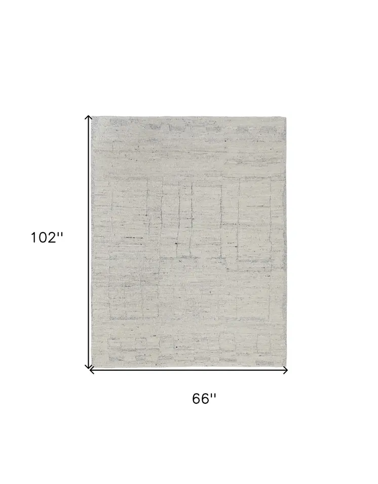6' X 9' Gray and Ivory Abstract Hand Woven Worn Faded Area Rug