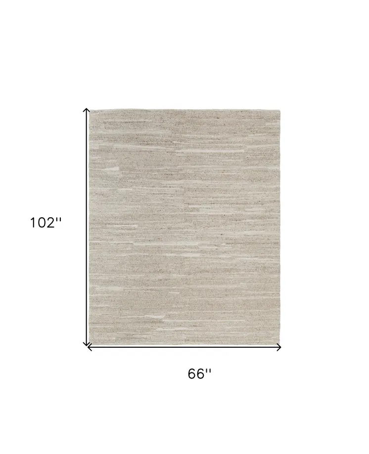 6' X 9' Ivory Abstract Hand Woven Worn Faded Area Rug