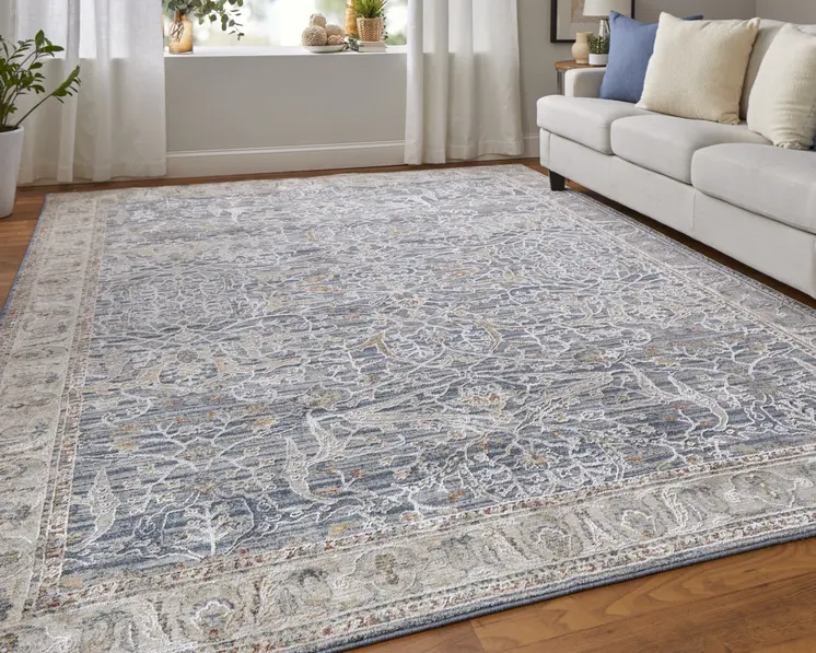 2' X 3' Taupe and Blue Ikat Power Loom Worn Faded Area Rug With Fringe