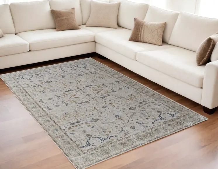 5' X 8' Gray Blue and Red Ikat Power Loom Worn Faded Area Rug With Fringe