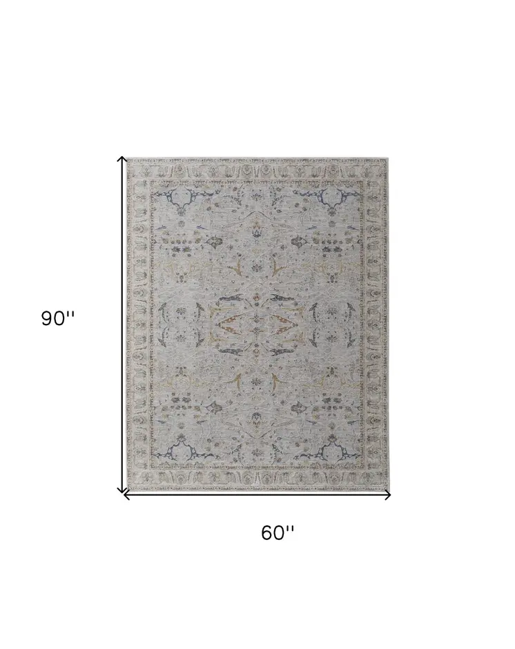 5' X 8' Gray Blue and Red Ikat Power Loom Worn Faded Area Rug With Fringe