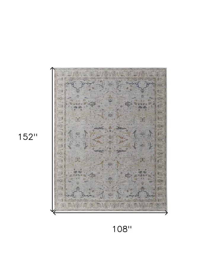 9' X 13' Gray Blue and Red Ikat Power Loom Worn Faded Area Rug With Fringe