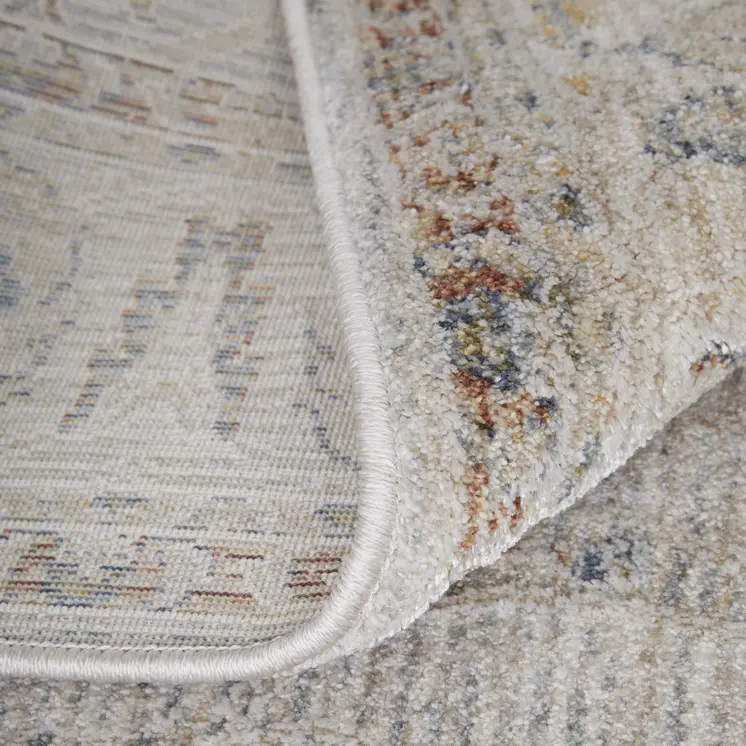 2' X 3' Ivory Taupe and Blue Ikat Power Loom Worn Faded Area Rug With Fringe
