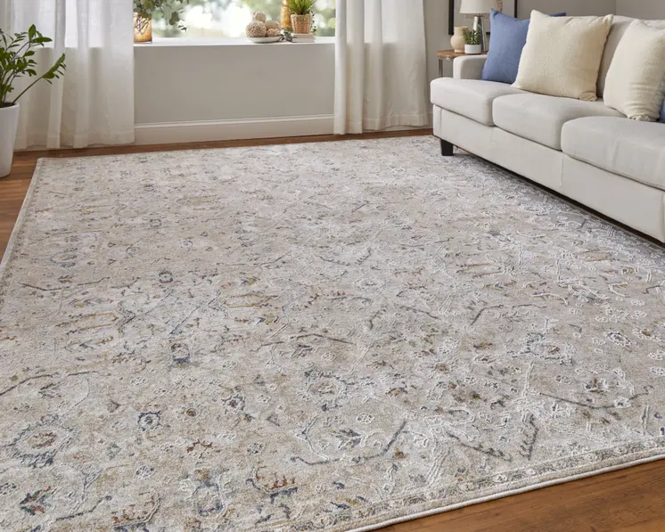 2' X 3' Ivory Taupe and Blue Abstract Power Loom Worn Faded Area Rug With Fringe