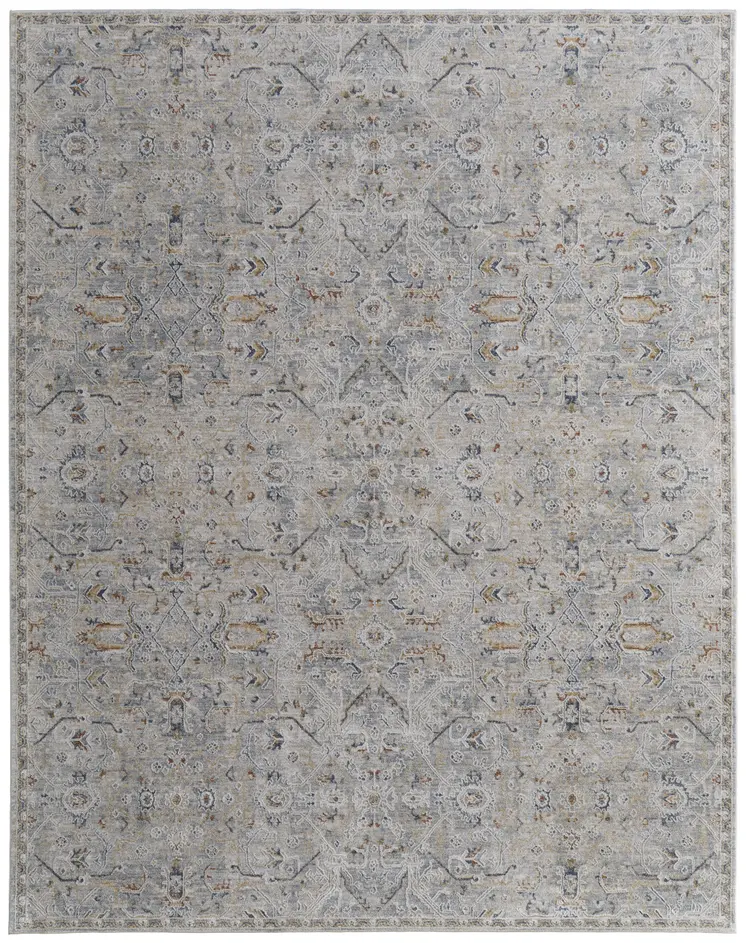 9' X 13' Ivory Tan and Blue Abstract Power Loom Worn Faded Area Rug With Fringe