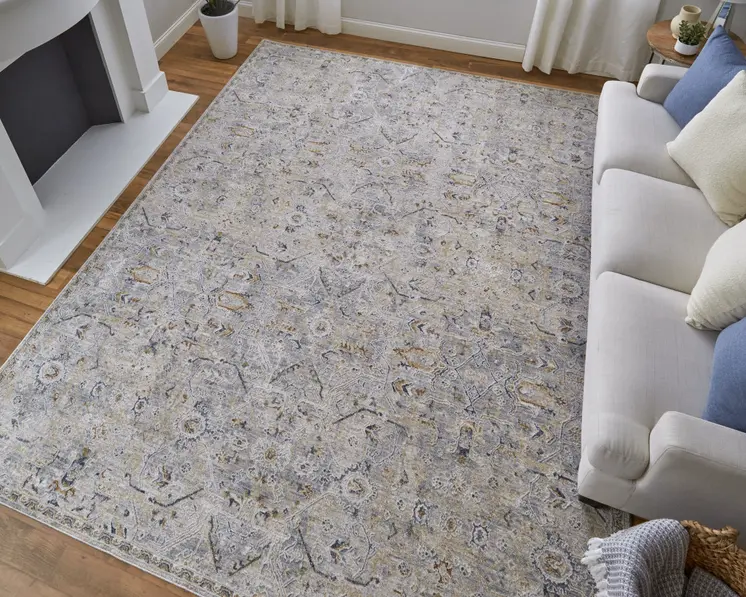 2' X 3' Ivory Tan and Blue Abstract Power Loom Worn Faded Area Rug With Fringe