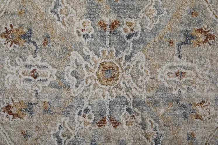 2' X 3' Ivory Tan and Blue Abstract Power Loom Worn Faded Area Rug With Fringe