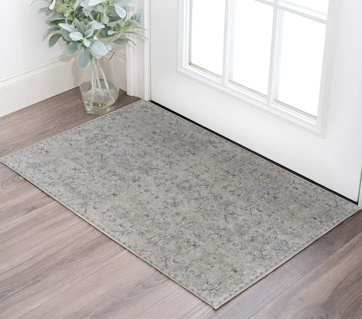 2' X 3' Ivory Tan and Blue Abstract Power Loom Worn Faded Area Rug With Fringe