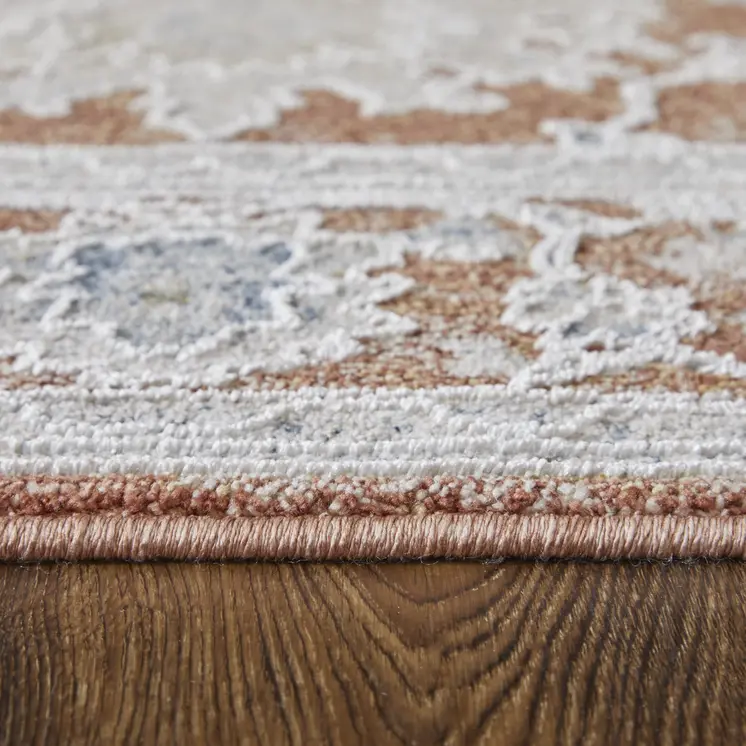 7' X 10' Red Blue and Ivory Floral Power Loom Worn Faded Area Rug With Fringe