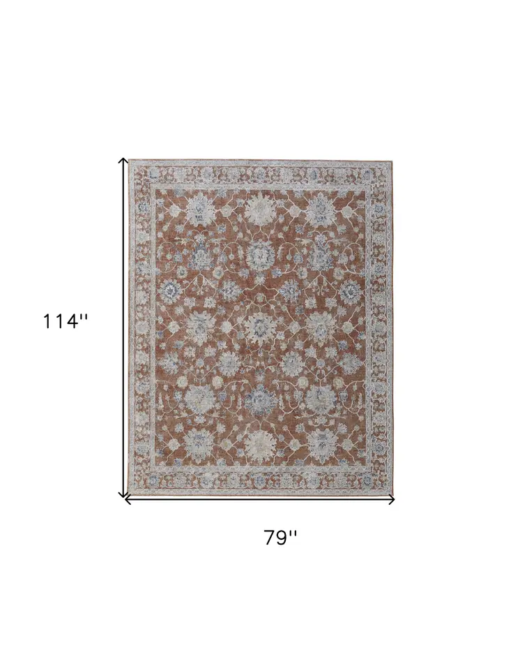 7' X 10' Red Blue and Ivory Floral Power Loom Worn Faded Area Rug With Fringe