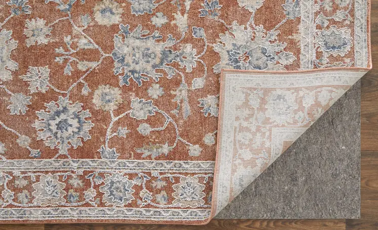 8' X 10' Red Blue and Ivory Floral Power Loom Worn Faded Area Rug With Fringe
