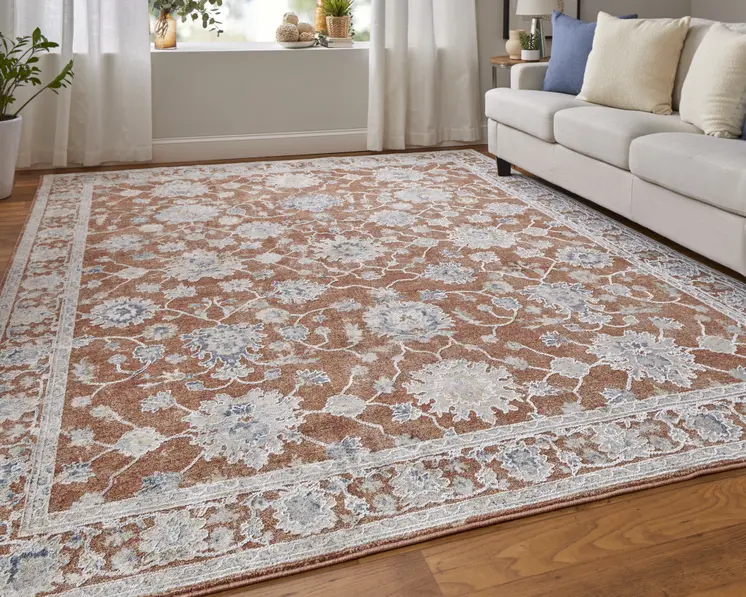 2' X 3' Red Blue and Ivory Floral Power Loom Worn Faded Area Rug With Fringe