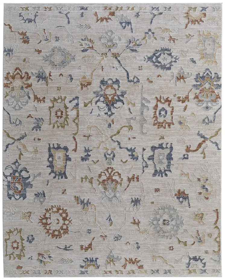 8' X 10' Ivory Blue and Gold Floral Power Loom Worn Faded Area Rug With Fringe
