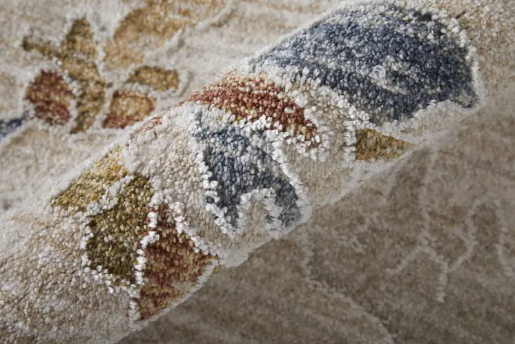 8' X 10' Ivory Blue and Gold Floral Power Loom Worn Faded Area Rug With Fringe