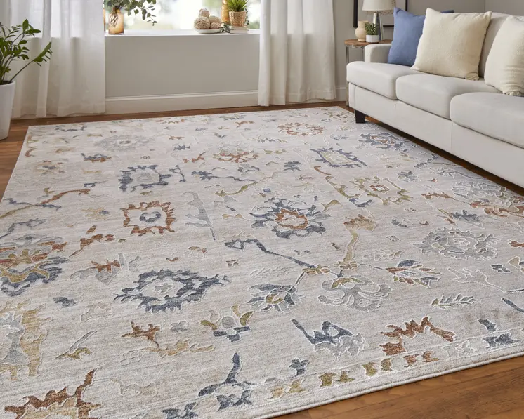 2' X 3' Ivory Blue and Gold Floral Power Loom Worn Faded Area Rug With Fringe
