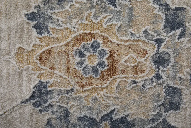 8' X 10' Ivory Taupe and Blue Floral Power Loom Worn Faded Area Rug With Fringe