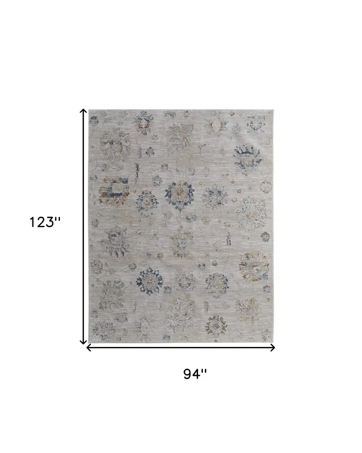 8' X 10' Ivory Taupe and Blue Floral Power Loom Worn Faded Area Rug With Fringe