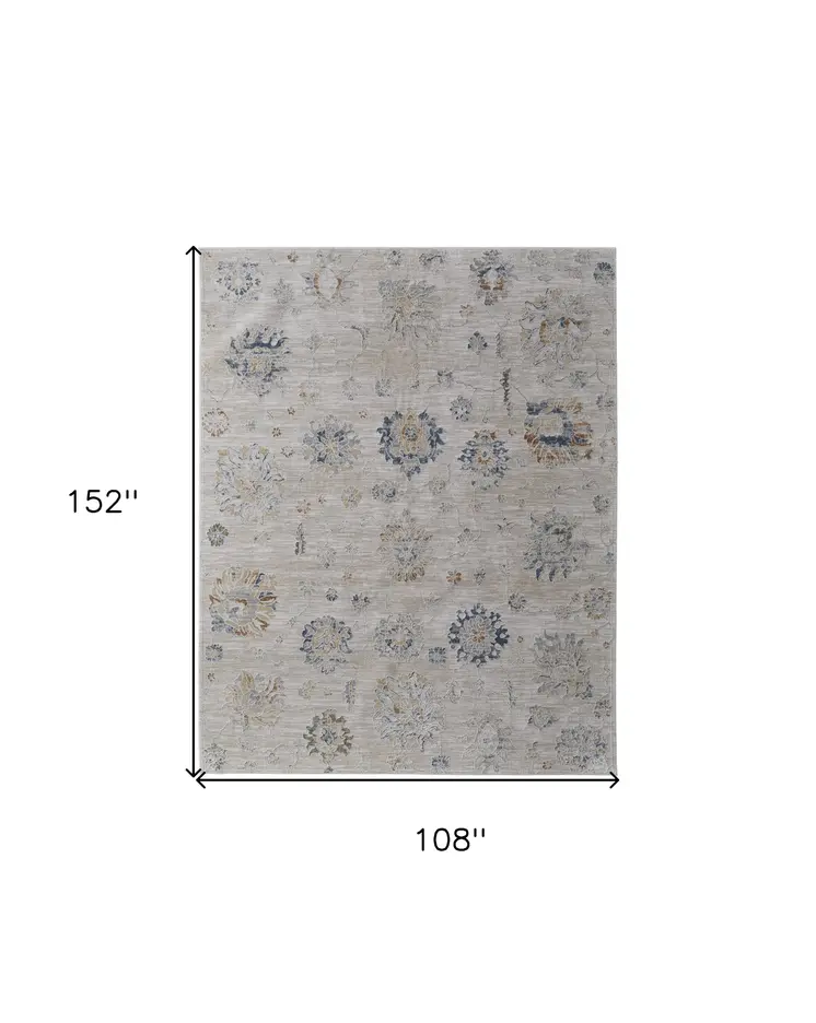 9' X 13' Ivory Taupe and Blue Floral Power Loom Worn Faded Area Rug With Fringe