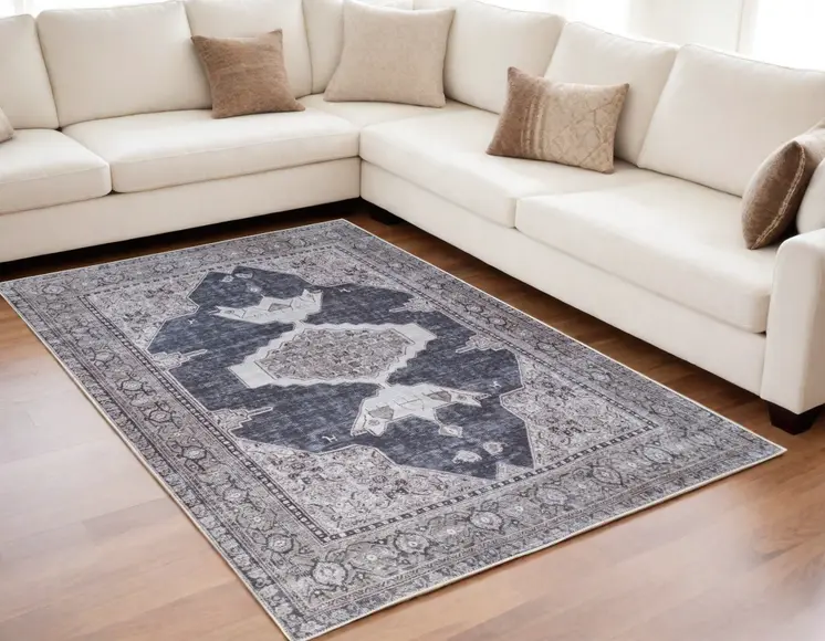 5' X 8' Gray Taupe and Ivory Oriental Power Loom Washable Area Rug