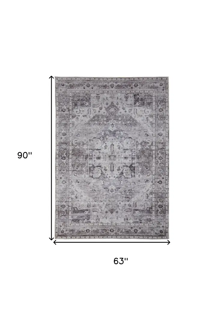 5' X 8' Gray and Ivory Oriental Power Loom Worn Faded Washable Area Rug