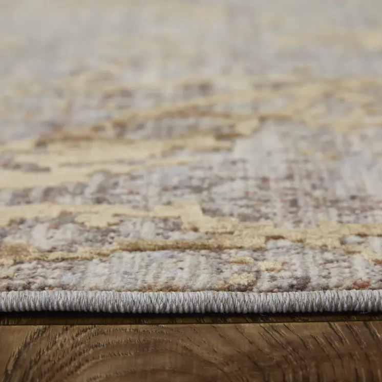 7' X 10' Brown Taupe and Tan Abstract Power Loom Area Rug