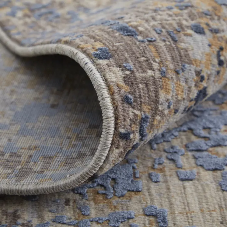 7' X 10' Blue Brown and Tan Abstract Power Loom Area Rug