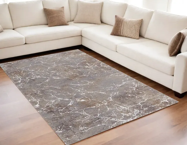 5' X 8' Ivory Brown and Taupe Abstract Power Loom Area Rug