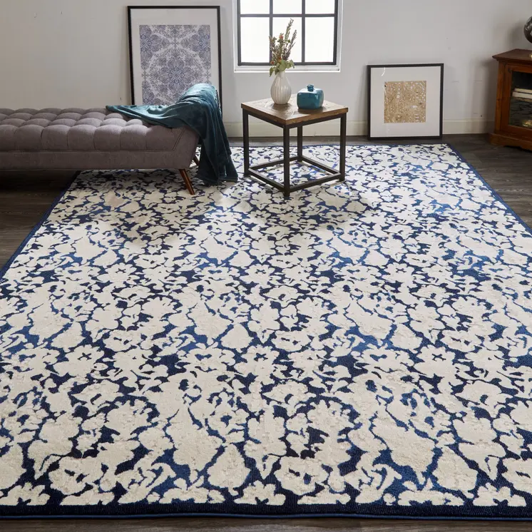 10' X 13' Blue and Ivory Abstract Power Loom Area Rug