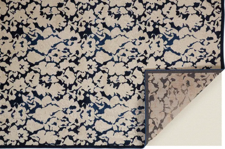 10' X 13' Blue and Ivory Abstract Power Loom Area Rug