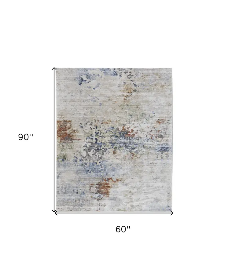 5' X 8' Red Blue and Ivory Abstract Power Loom Area Rug