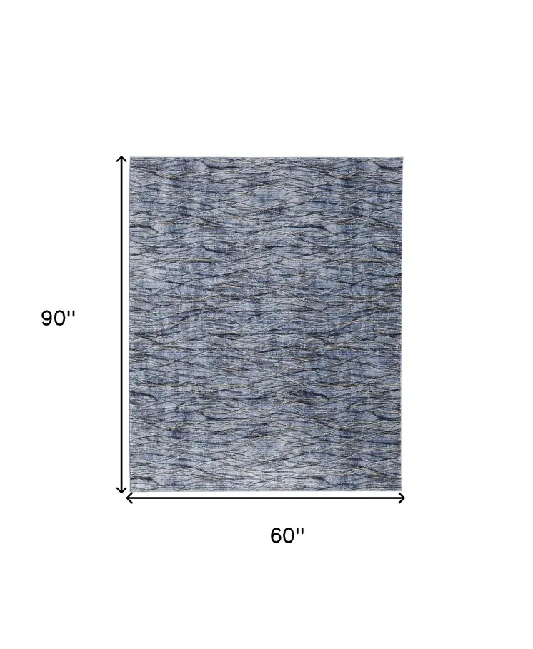 5' X 8' Blue Ivory and Tan Abstract Power Loom Area Rug
