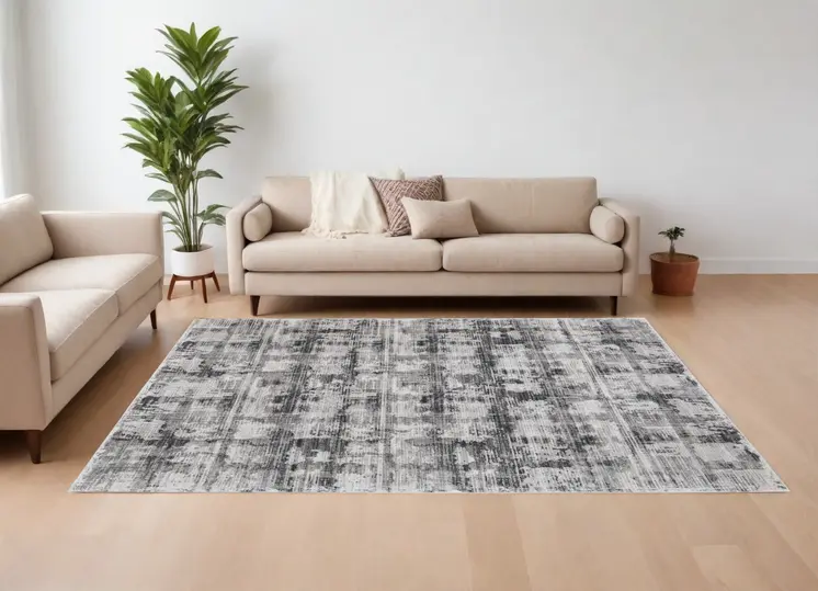 9' X 13' Gray and Ivory Abstract Power Loom Area Rug