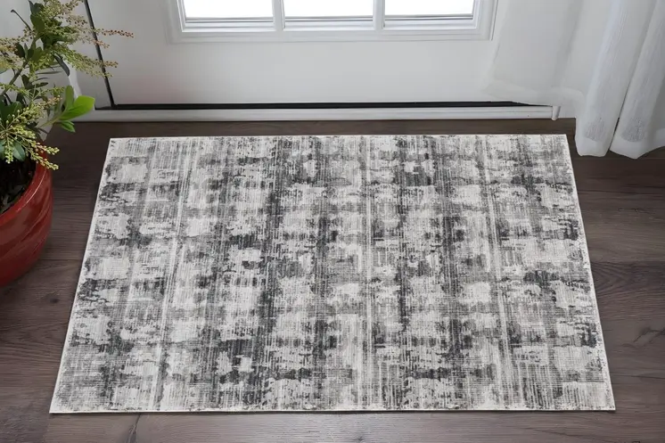 2' X 3' Gray and Ivory Abstract Power Loom Area Rug