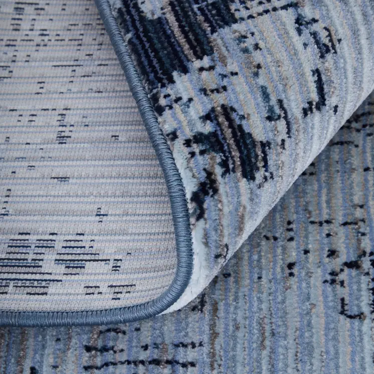 5' X 8' Light Blue and Black Abstract Power Loom Area Rug