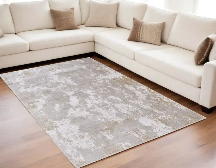 5' X 8' Gray Brown and Ivory Abstract Power Loom Area Rug