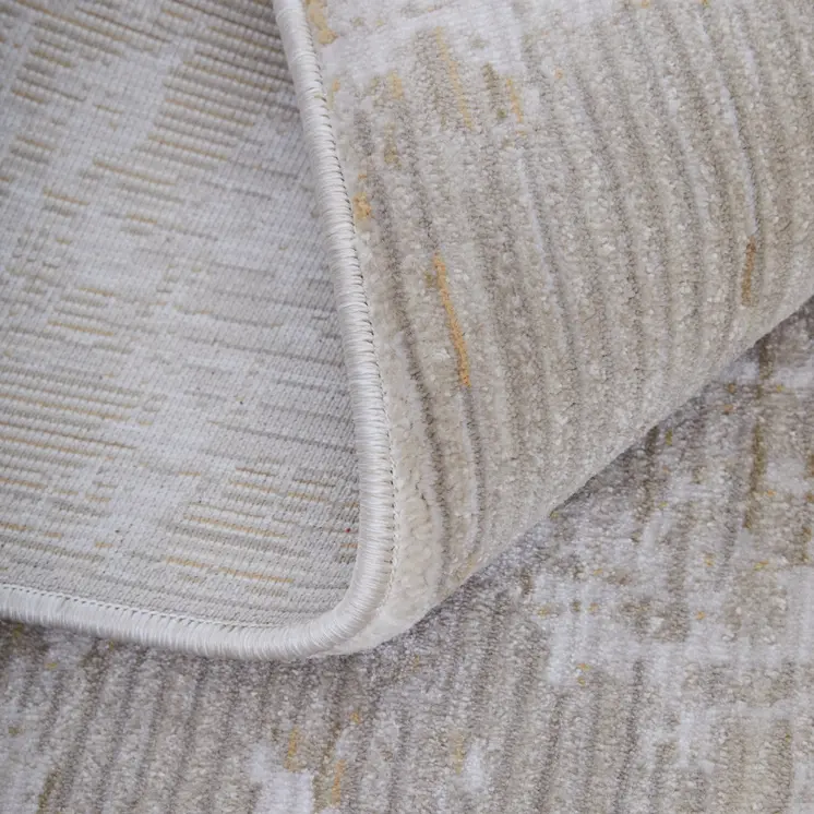 5' X 8' Gray Brown and Ivory Abstract Power Loom Area Rug