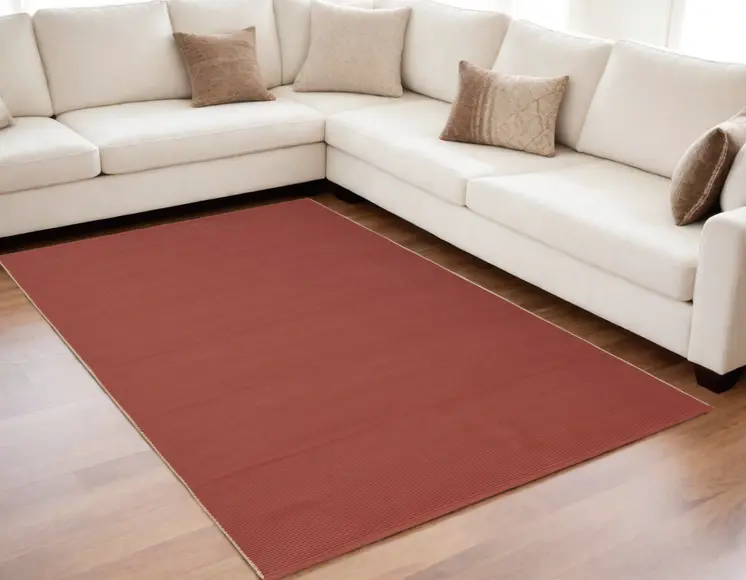 5' X 8' Red and Tan Hand Woven Area Rug