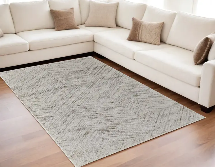 5' X 8' Ivory and Brown Geometric Power Loom Area Rug
