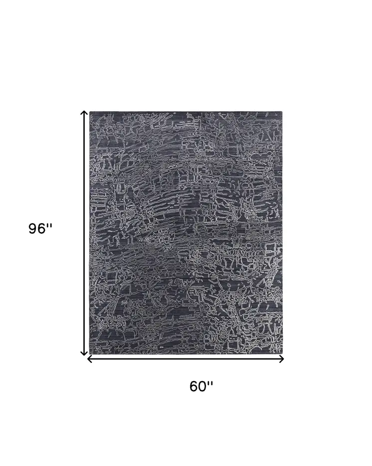 5' X 8' Black Gray and Ivory Abstract Hand Woven Area Rug