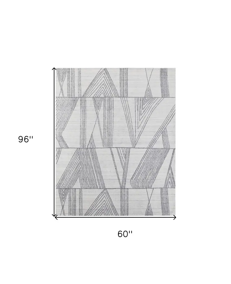 5' X 8' Black and Ivory Abstract Hand Woven Area Rug